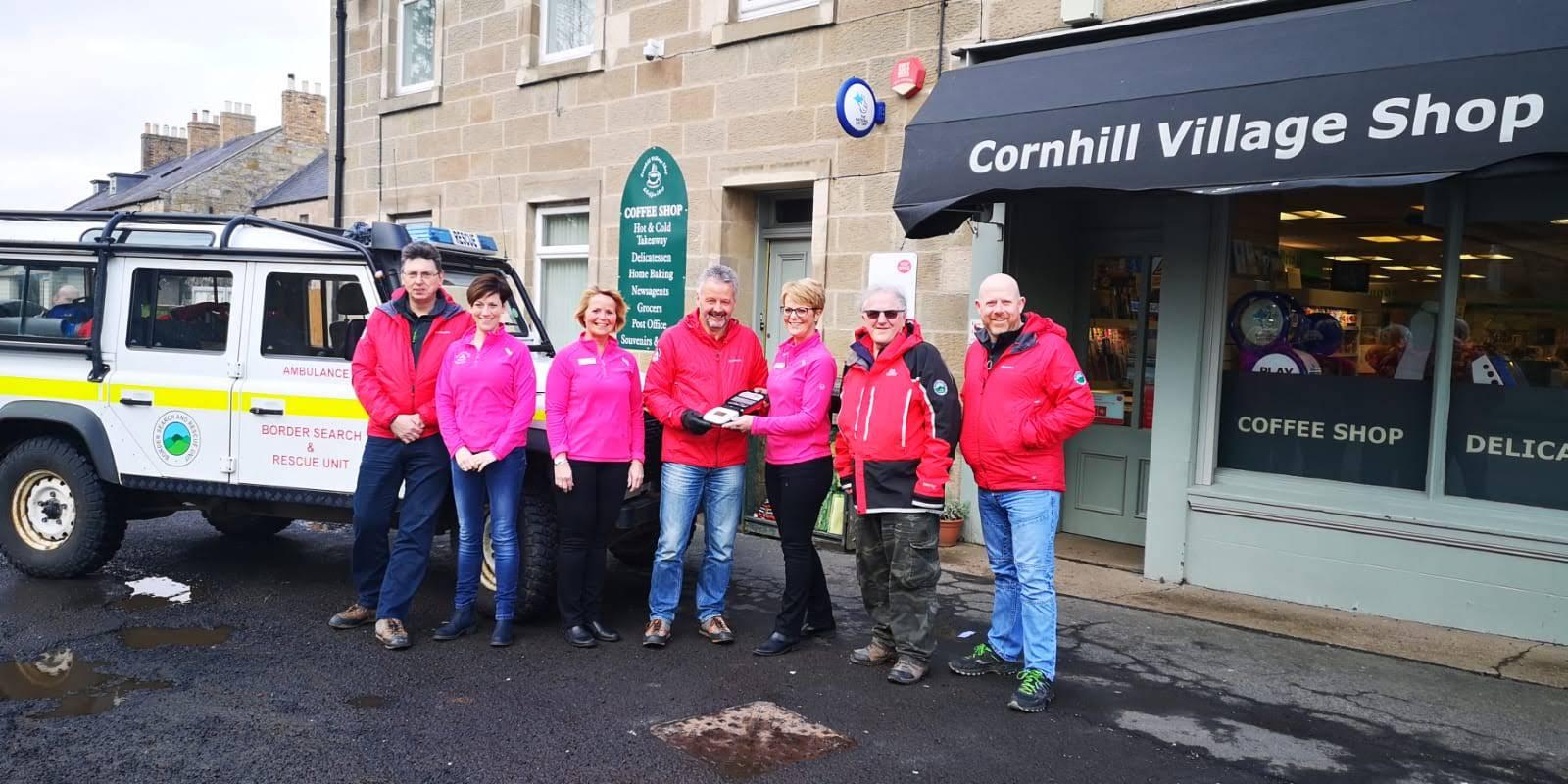 Cornhill Village Shop girls presentation of portable defibrillator  to BSARU